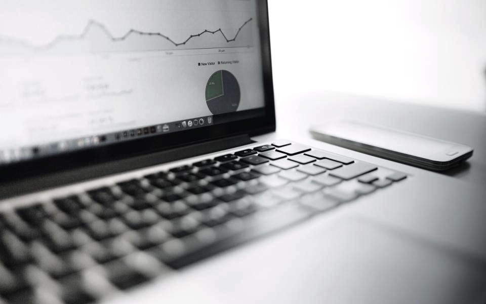 A laptop showing search traffic and ranking reports